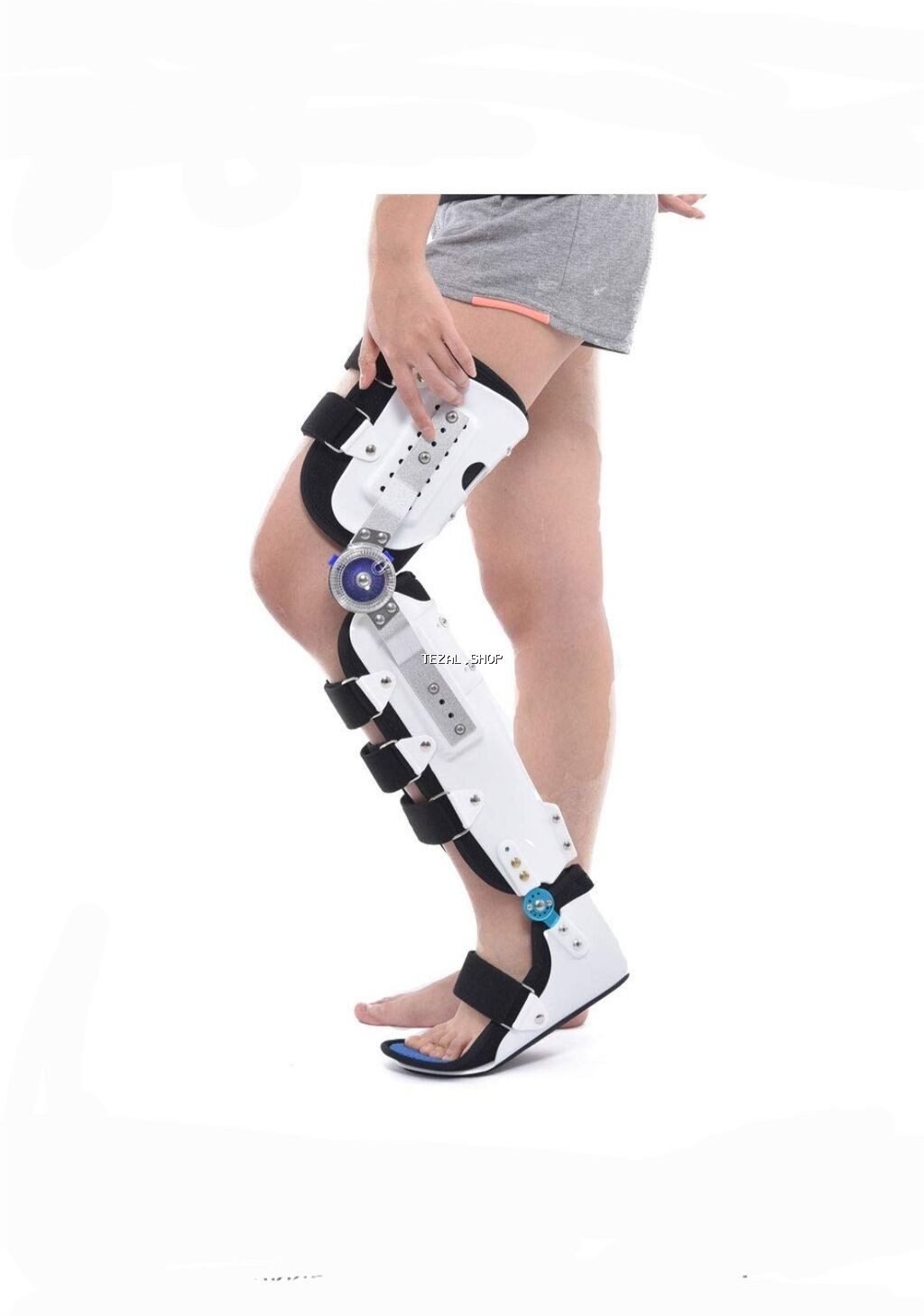 Bərkidici qayışlarla təchiz olunmuş, dirsəkli ortez. Ayağın hərəkətini