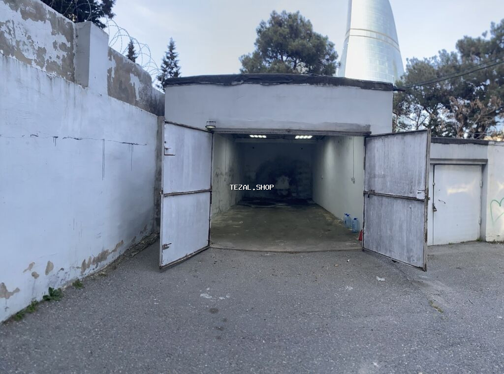 Avtodayanacaq/qapalı qaraj - Yerləşmə: Milli Məclisin yanı İzzət