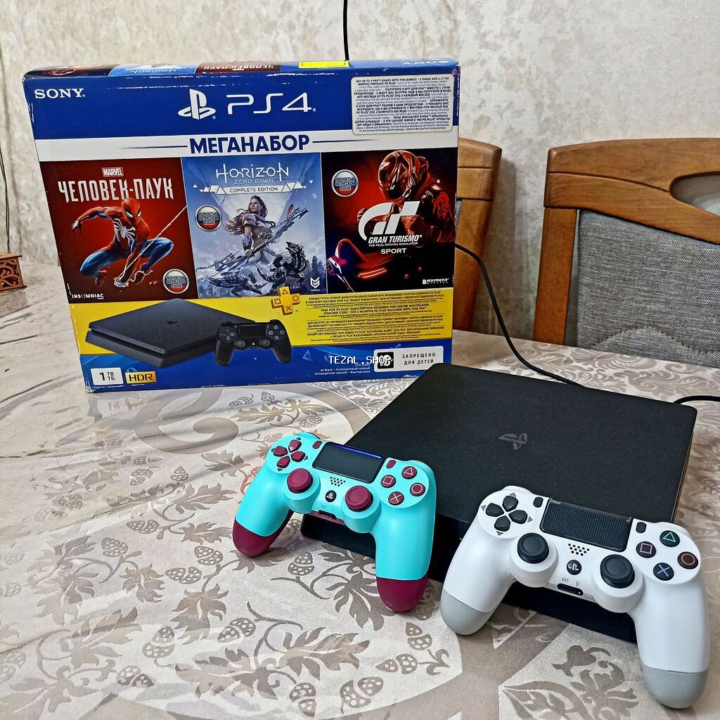 Playstation 4 slim (1 tb) ideal veziyetdedi qutusuna geder senedlerine