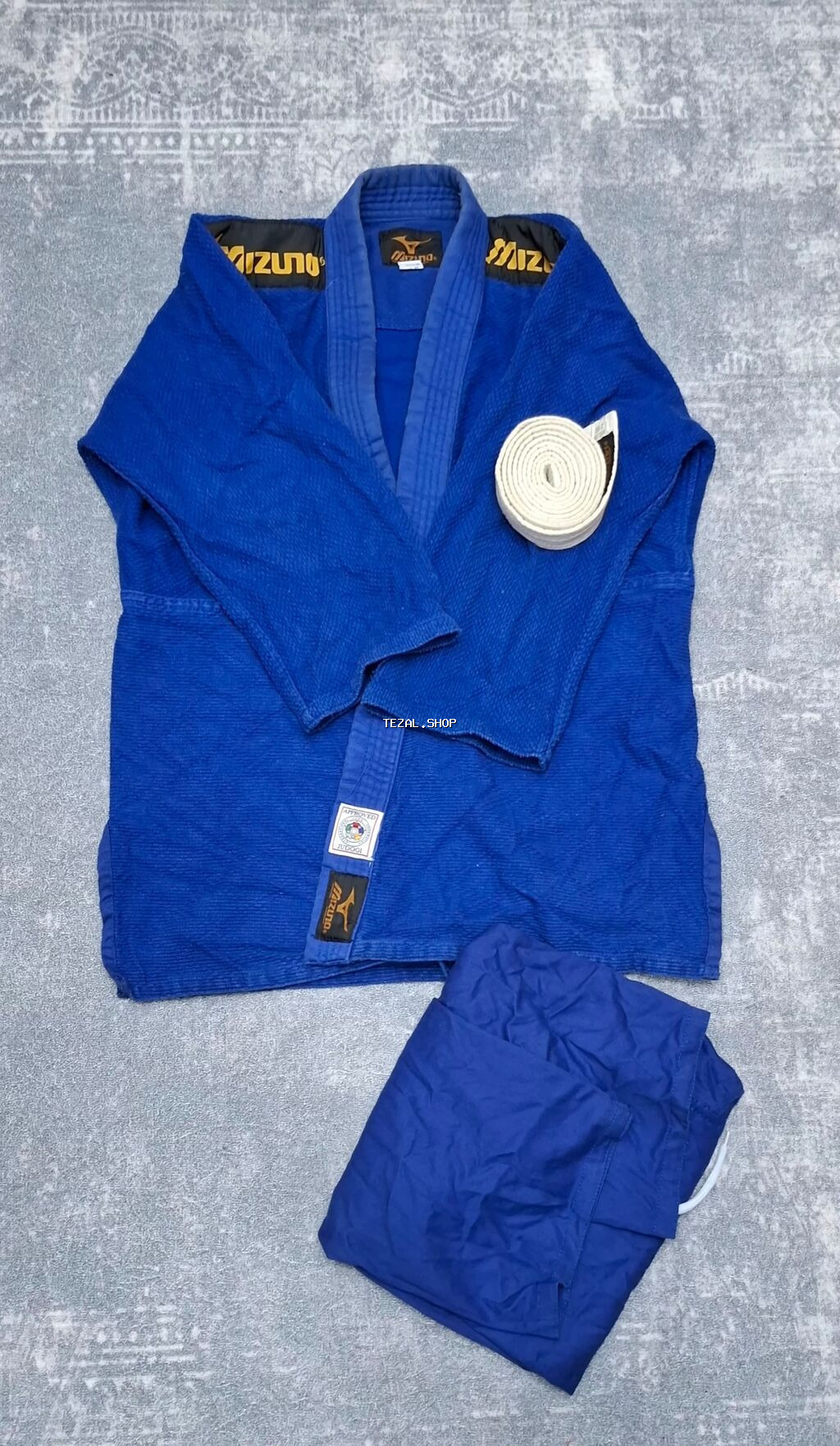 -Brend-Mizuno - Yirtiği lekesi yoxdur -Cemi 2-3 dəfə geyinilib -Ölcu