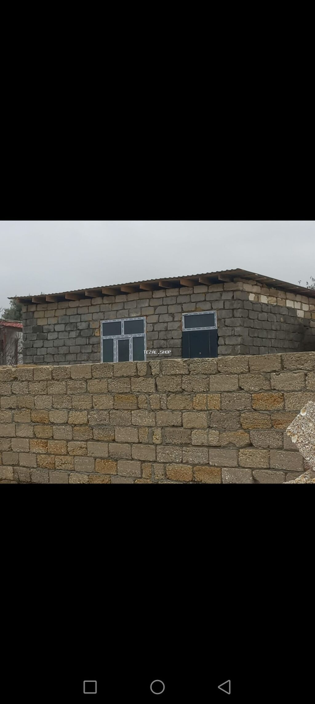 Kürdəxanıda ev satilir 2 sotda 2 otaq 1 zal heyetde yer var kuxnaya