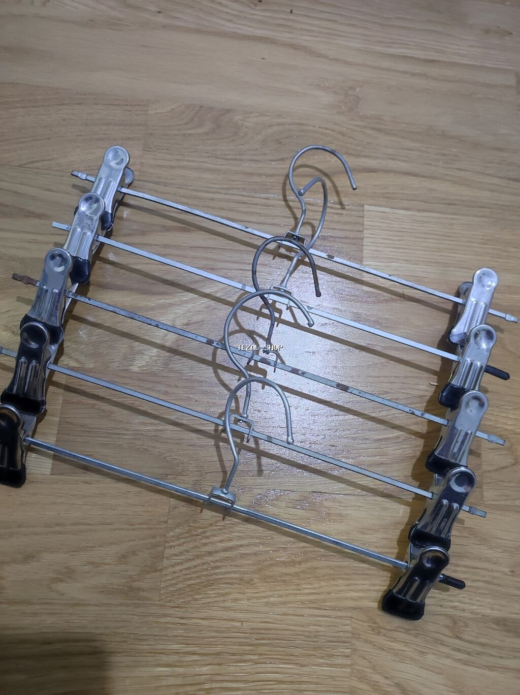 5 ededi 1 azn.Metal çoxsəviyyəli ətək/şalvar asqısı - Material