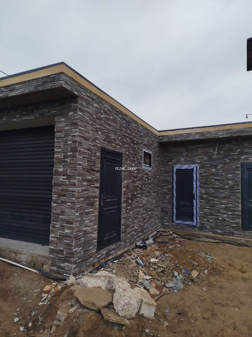 Dekorativ həyət divarı üçün üzlük daş və panellər - Material