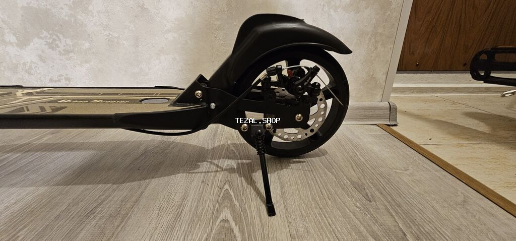 Usaqlar üçün yığcam və rahat şosse skuter 100 kq qeder agirliqa