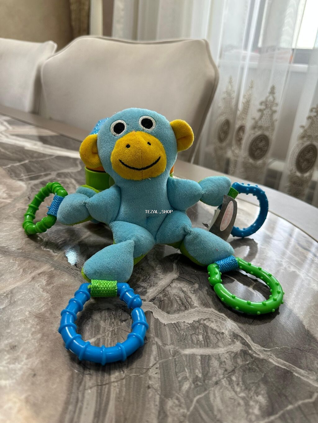 Usaq oyuncagi.Kalyaskadan ve besikden asilir.Her halqasindan asmaq - şəkil 2