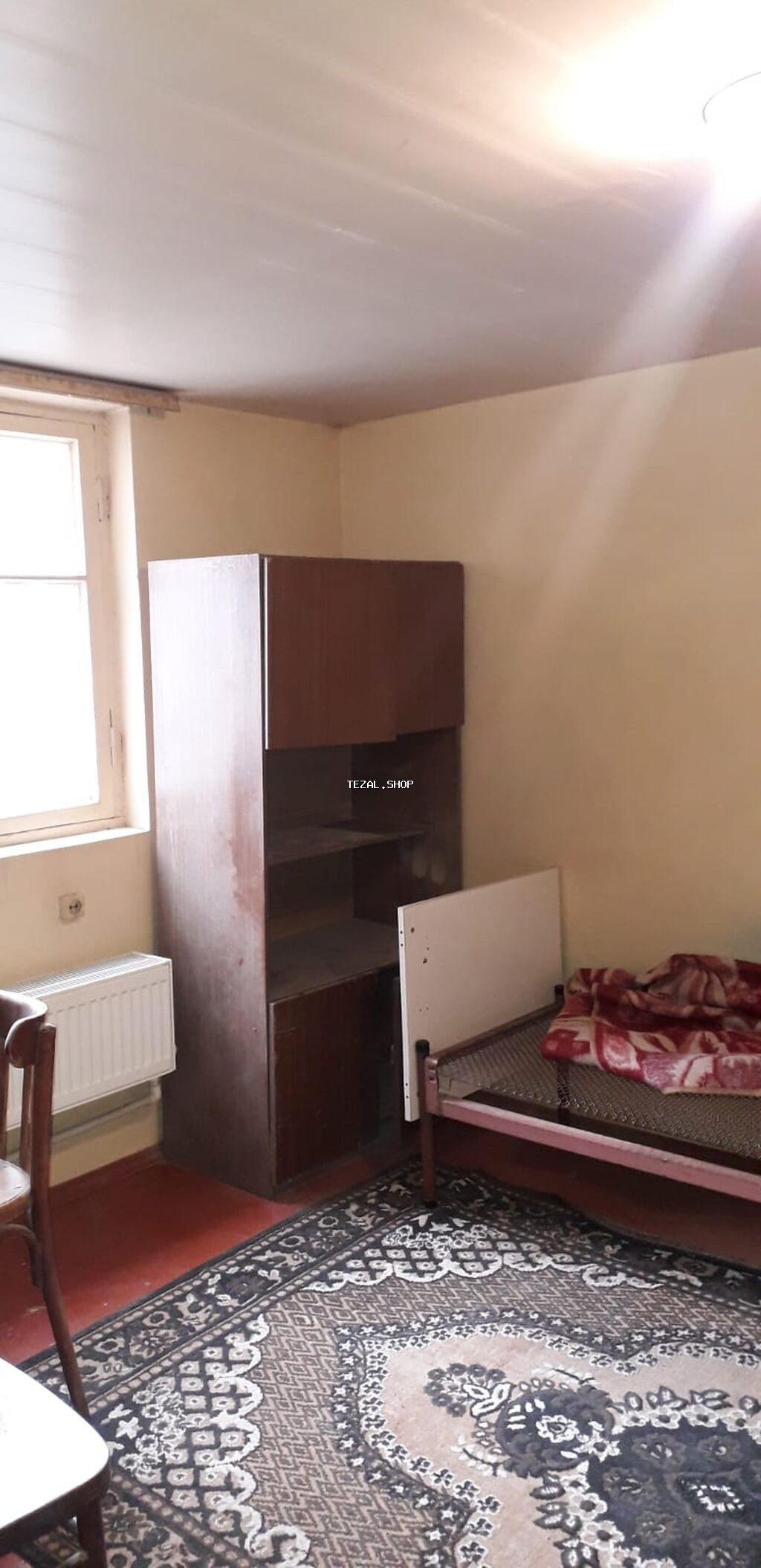 Kirayə üçün sadə, funksional otaq. - Plan: 1 otaq, hündür tavanlı