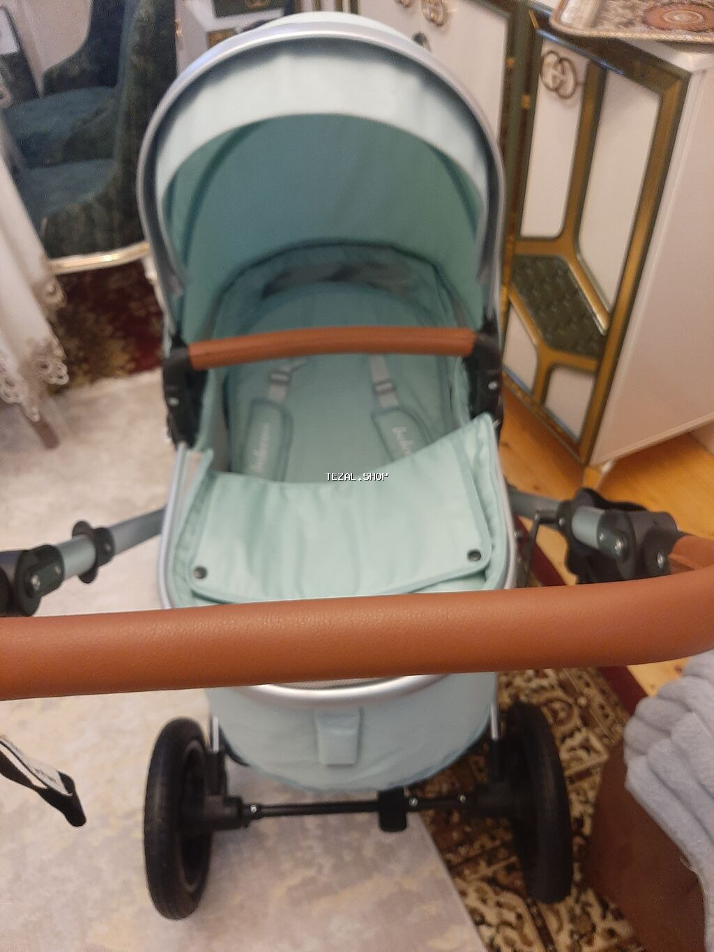 Çıxarıla bilən beşikli araba, Ünvandan götürmə