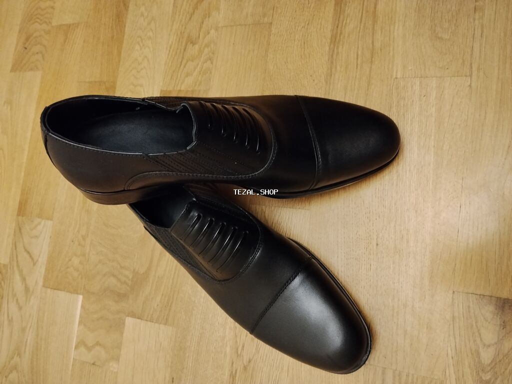 Kişi üçün klassik qara tufli. 43 razmer yenidir. 65 alınıb 45 AZN