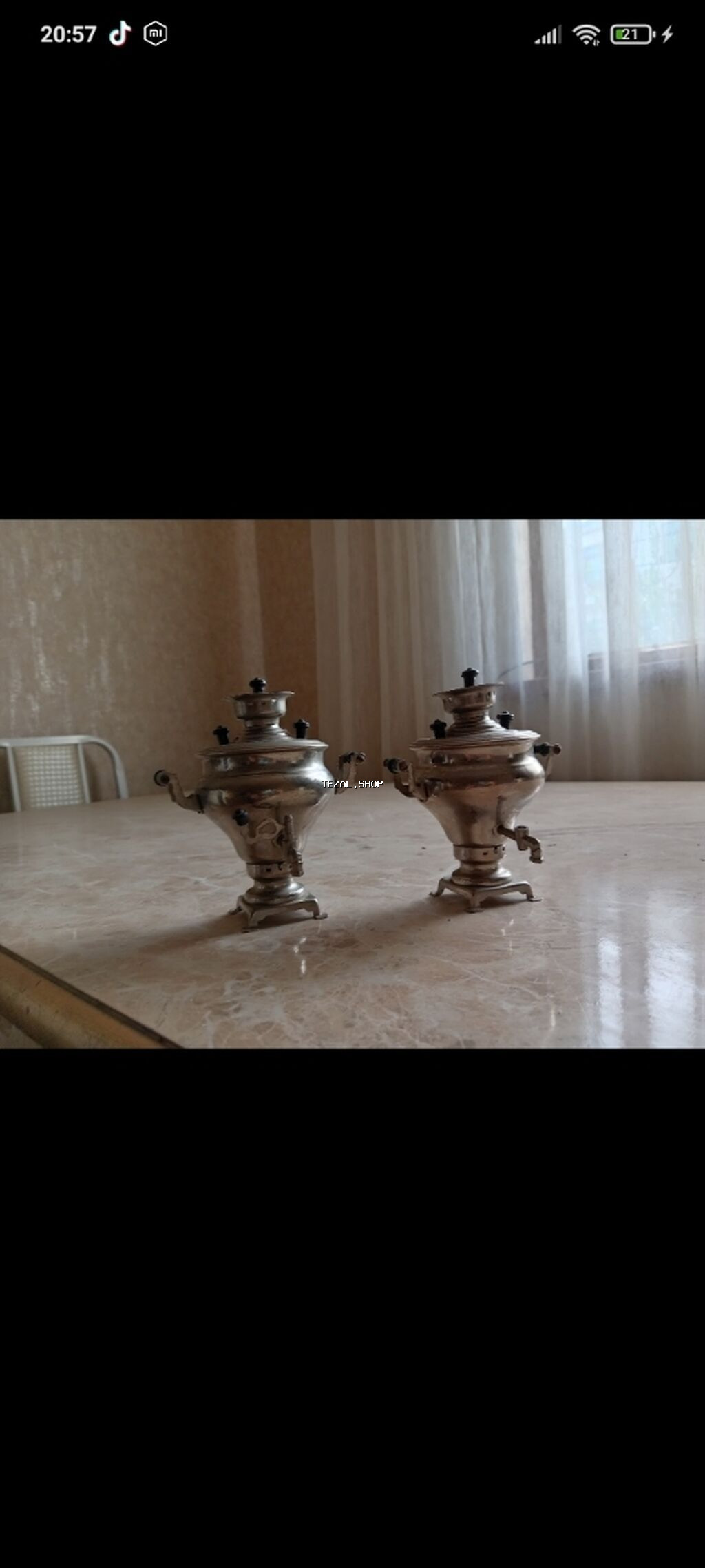 Masa üstü istifadə üçün nəzərdə tutulmuş iki ədəd gümüşü rəngli
