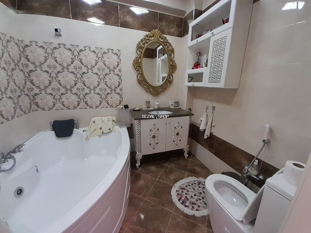 Geniş və işıqlı mənzil – klassik üslubda zövqlə dizayn olunmuş - şəkil 4