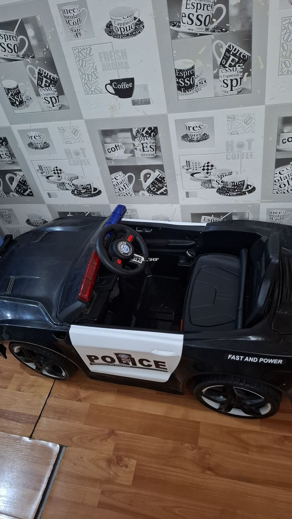 Uşaq üçün elektrikli polis maşını - Korpus: qara-ağ rəngdə, “POLICE”