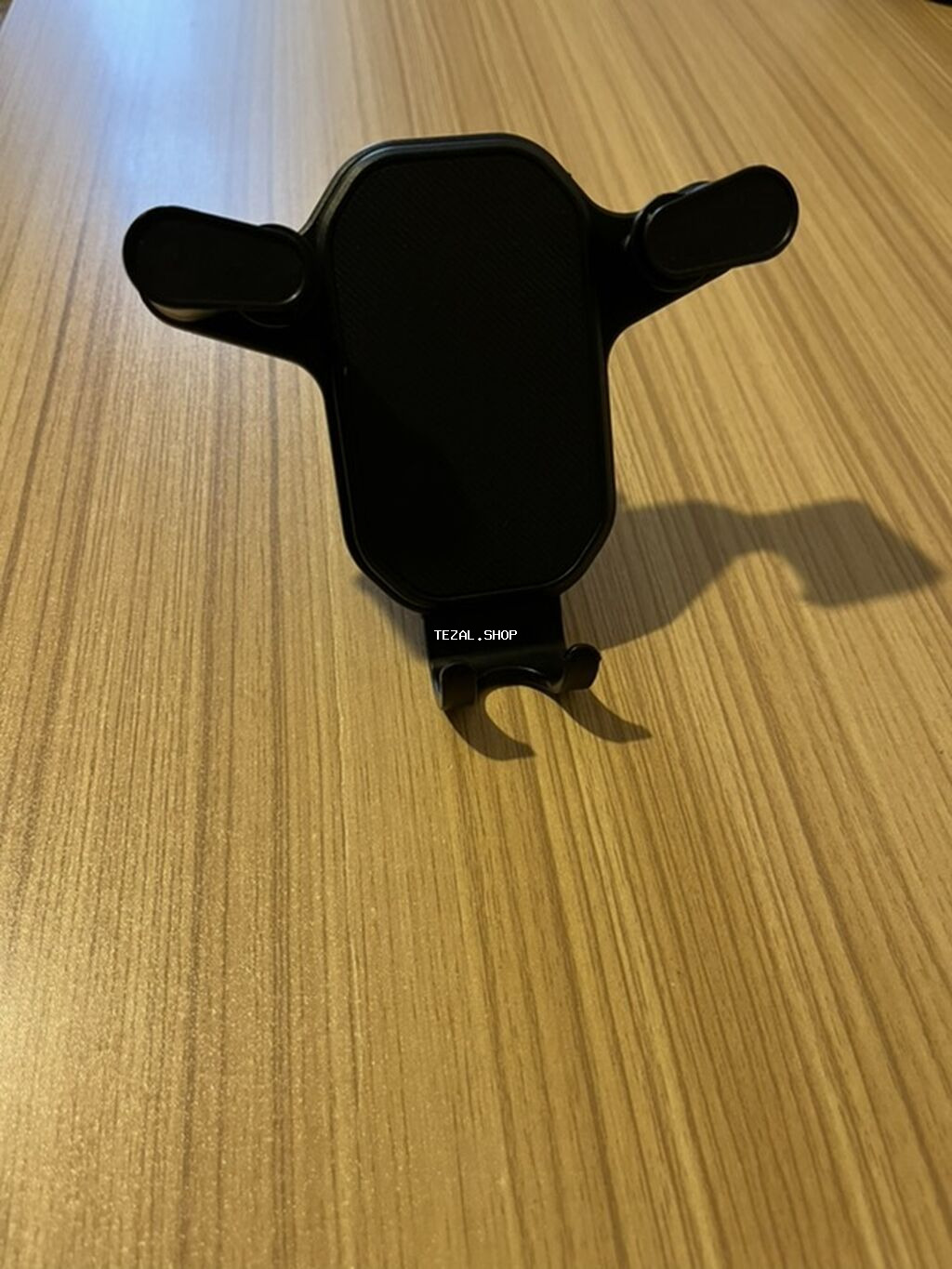 Avtomobil üçün hava çıxışına taxılan telefon tutacağı. Stokda cəmi