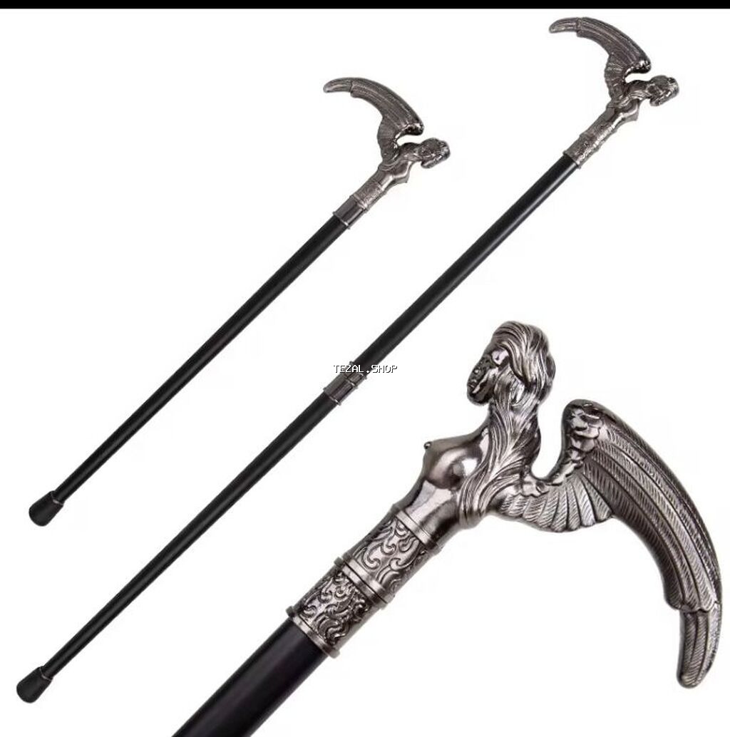 Qara rəngli, gümüşü rəngli qulp ilə bəzədilmiş əsa. Əsanın qulpu qadın