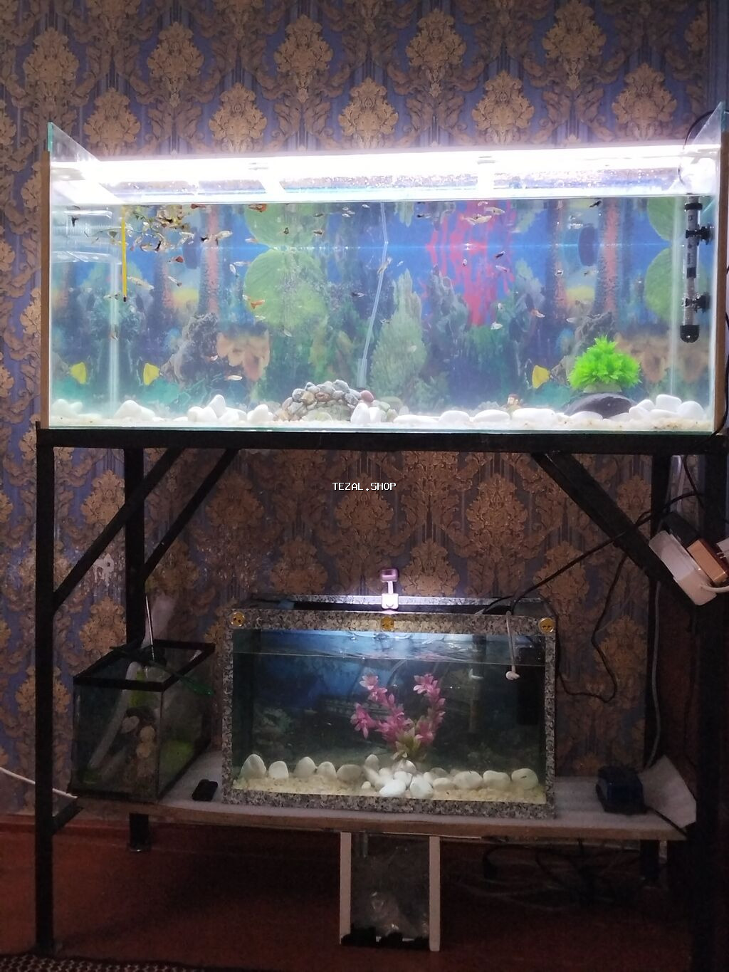 1m 3sm uzunu,37en,hundurluk 43 sm akvarium 200litrlik, awagidaki