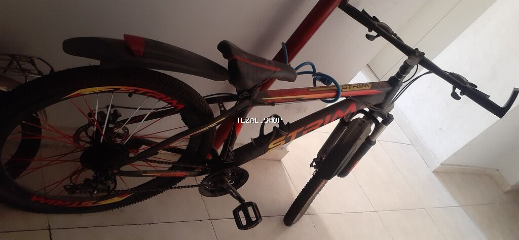 STRIM brendli dağ velosipedi - Rəng: qara üzərində qırmızı-sarı