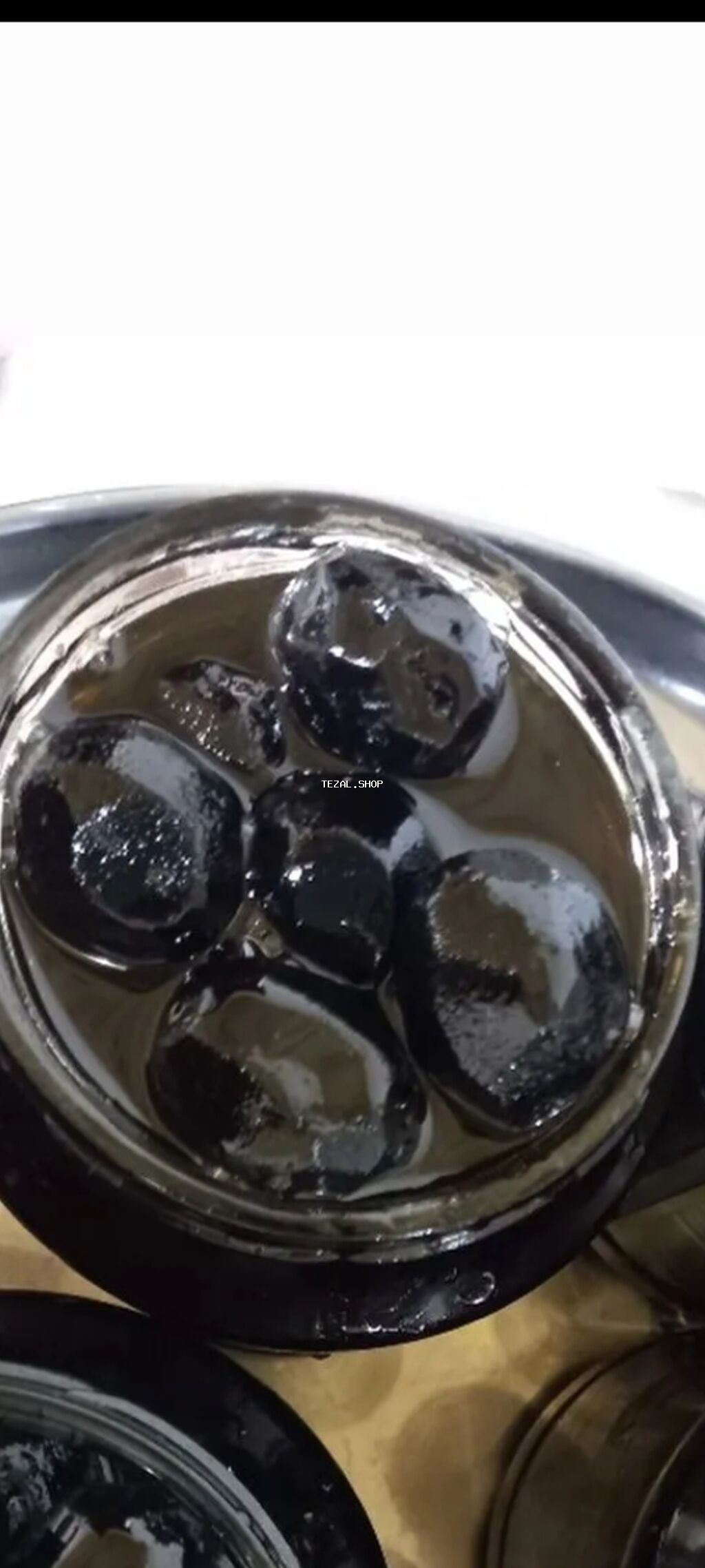 Məhsul: Qara zeytun konservi (şüşə bankada) Təsvir: - Tam bütöv, iri