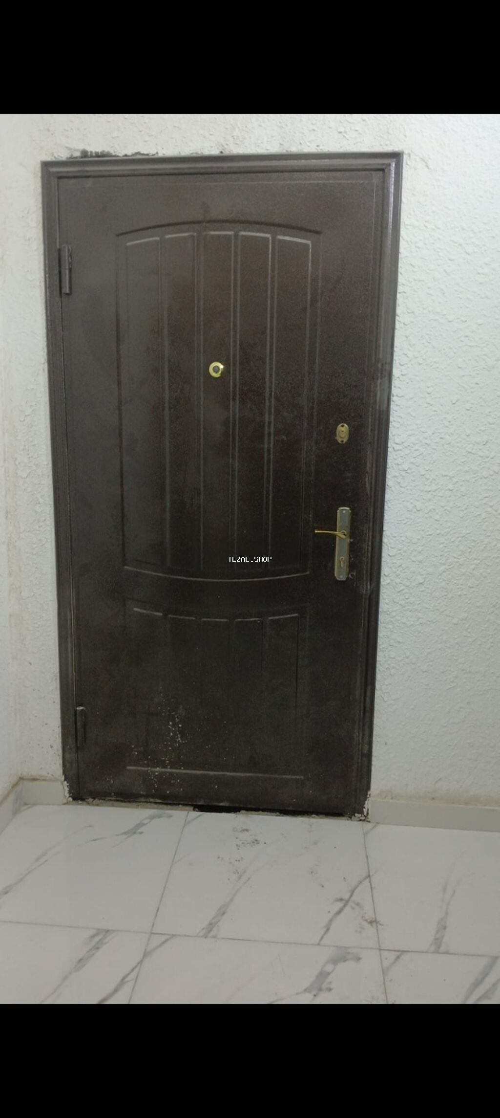 İşlənmiş Giriş qapısı Ünvandan götürmə
