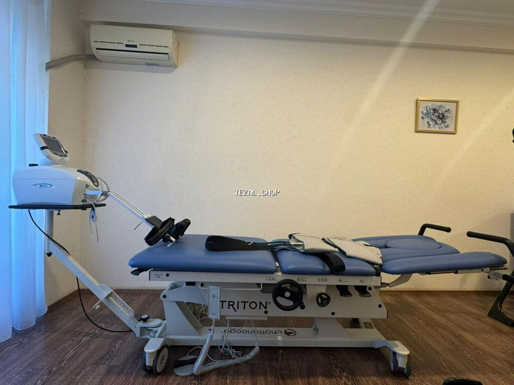 İşlənməmiş traksiya aparatı Chatanoga firmasına məxsus. Vertebra