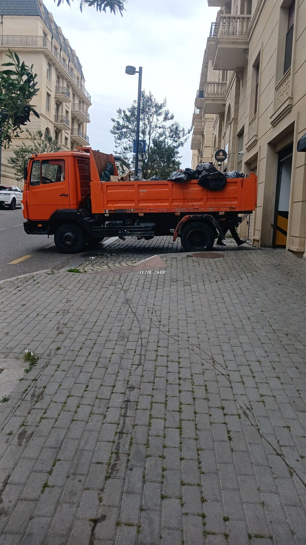 Tikinti tullantılarının daşınması xidməti - Orta ölçülü narıncı - şəkil 3