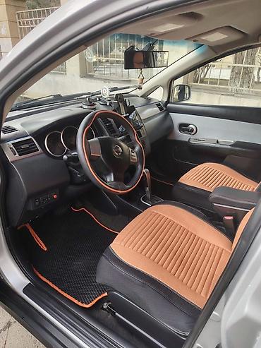 Nissan Tiida: 1.8 l | 2009 il Hetçbek - şəkil 2