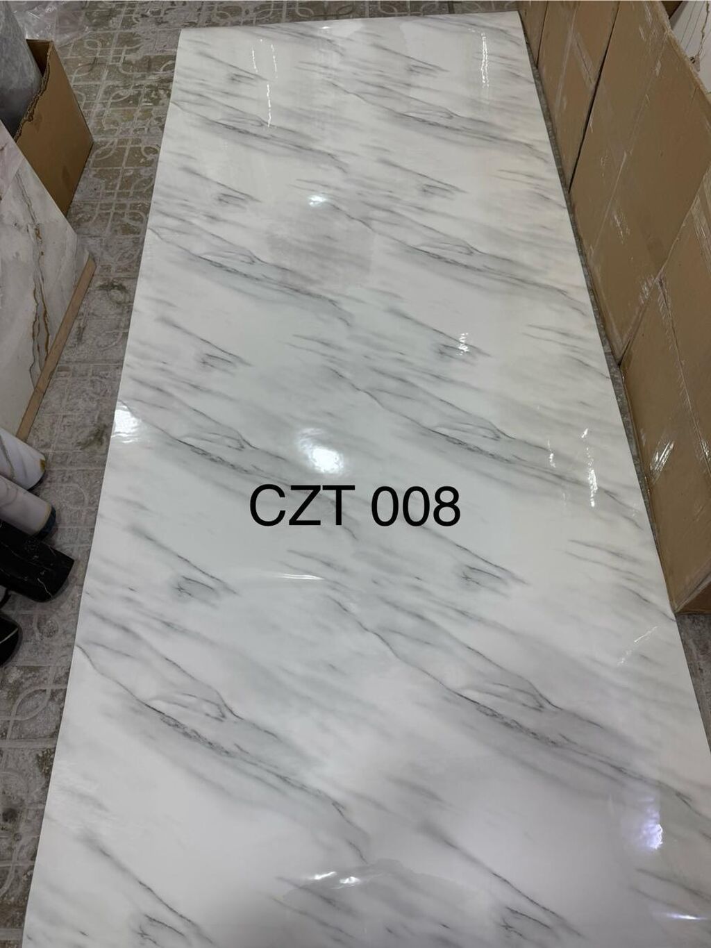 Hamam ucun kafel evezi mermer paneller . Suvaqin ustunden kafelin