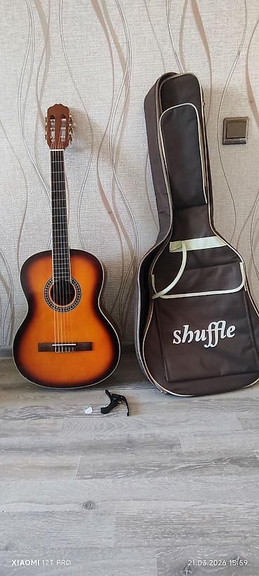 Klassik gitara, İşlənmiş, Ünvandan götürmə - şəkil 2