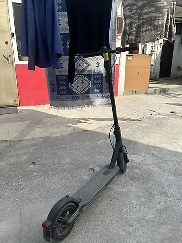 İşlənmiş Elektrik samokat ≤ 5", 351 - 500 Vt, 16 - 25 km/s, Ünvandan götürmə - şəkil 2