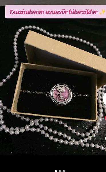 Tənzimlənən “asansör” bilərziklər və hədiyyəlik musiqi qutusu - - şəkil 2