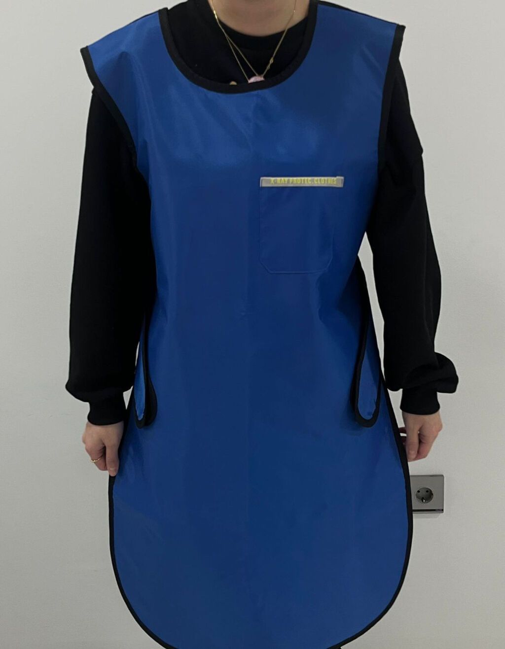 Rentgen otağı üçün nəzərdə tutulmuş qurğuşun önlük. Yenidir, istifadə