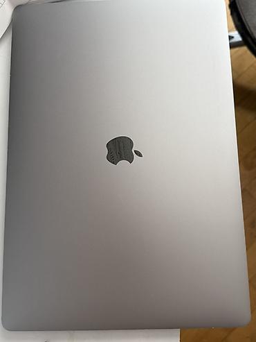 MacBook Pro çox yaxşı vəziyyətdədir. Heç bir problemi yoxdur, ideal - şəkil 2