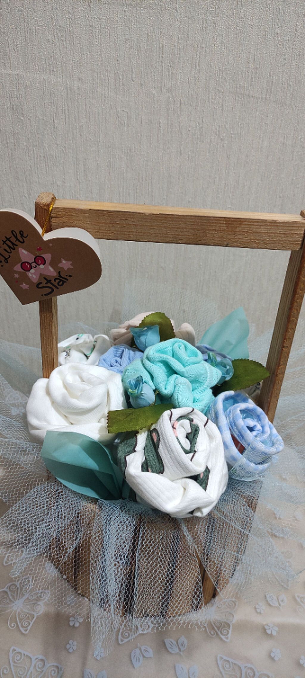 Korpe geyimlerinden buket sifarişle de hazirlanir