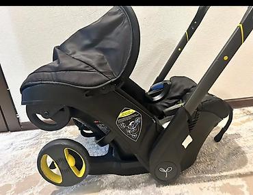 Doona tipli avtomobil oturacağı arabası təkərlərə malik uşaq avtomobil - şəkil 2