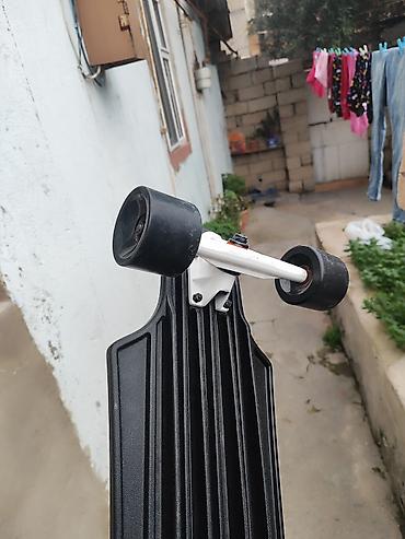 Uzun lövhə (longboard) – 100 kq çəkisi olan belə isdifade eliye - şəkil 3