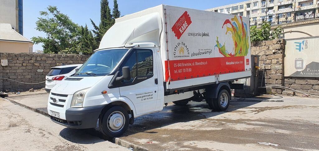 Yük daşima. Tikinti materiallarinin mebellərin daşinmasi, ofis ev