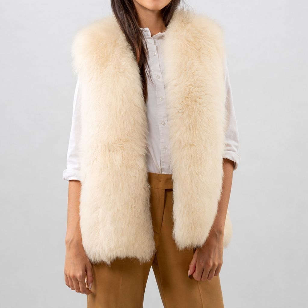 Fil sümüyü rəngli süni kürk jilet, yenidir. Ölçü= M/L ölçülərinə